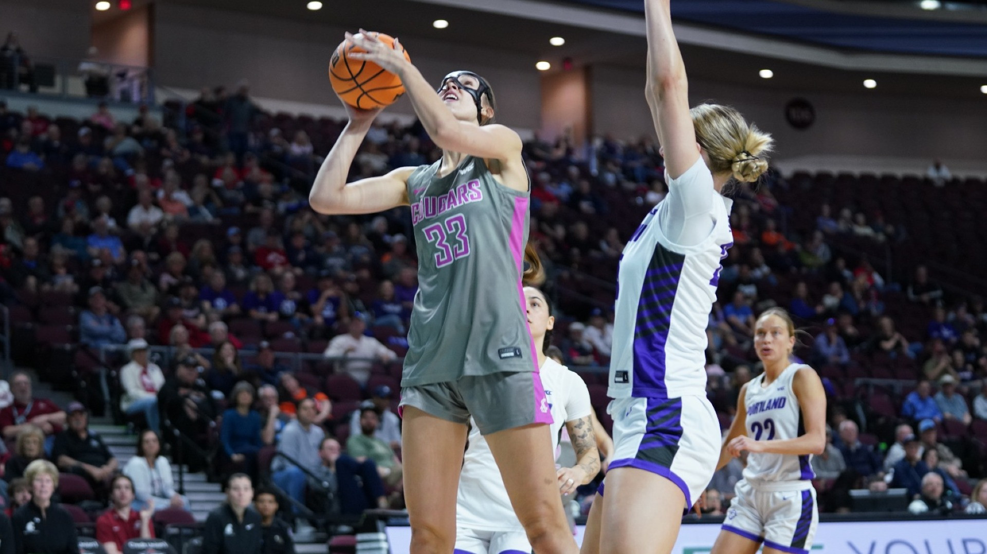 26_3_7 WSU WBB Alex Covill steps up for a jump shot against Portland