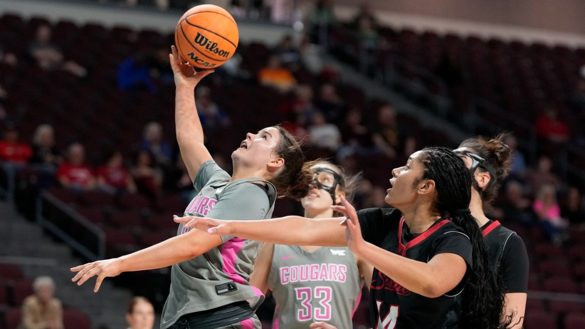 26_3_5 WSU WBB Mackenzie Chatfield drives through the lane for a layup against Seattle U